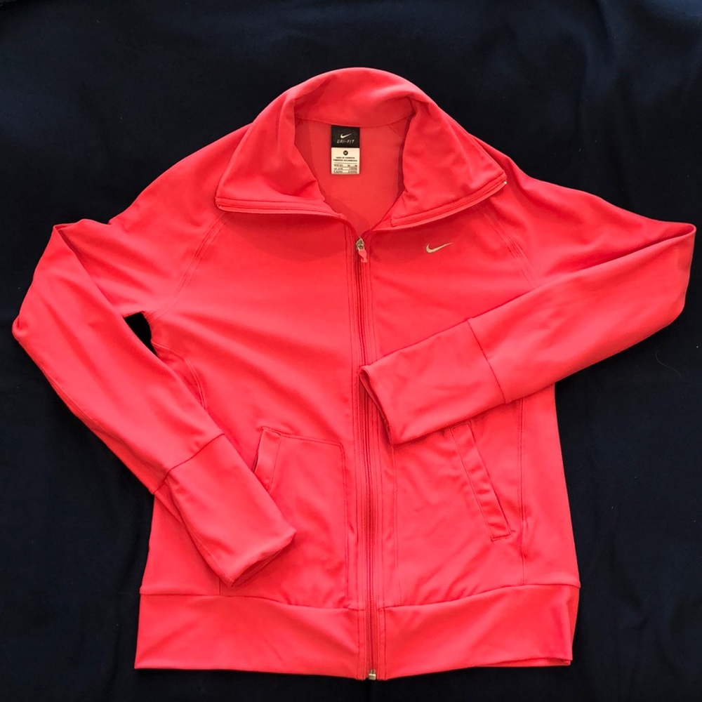 Nike DriFit zip up jacket in pink